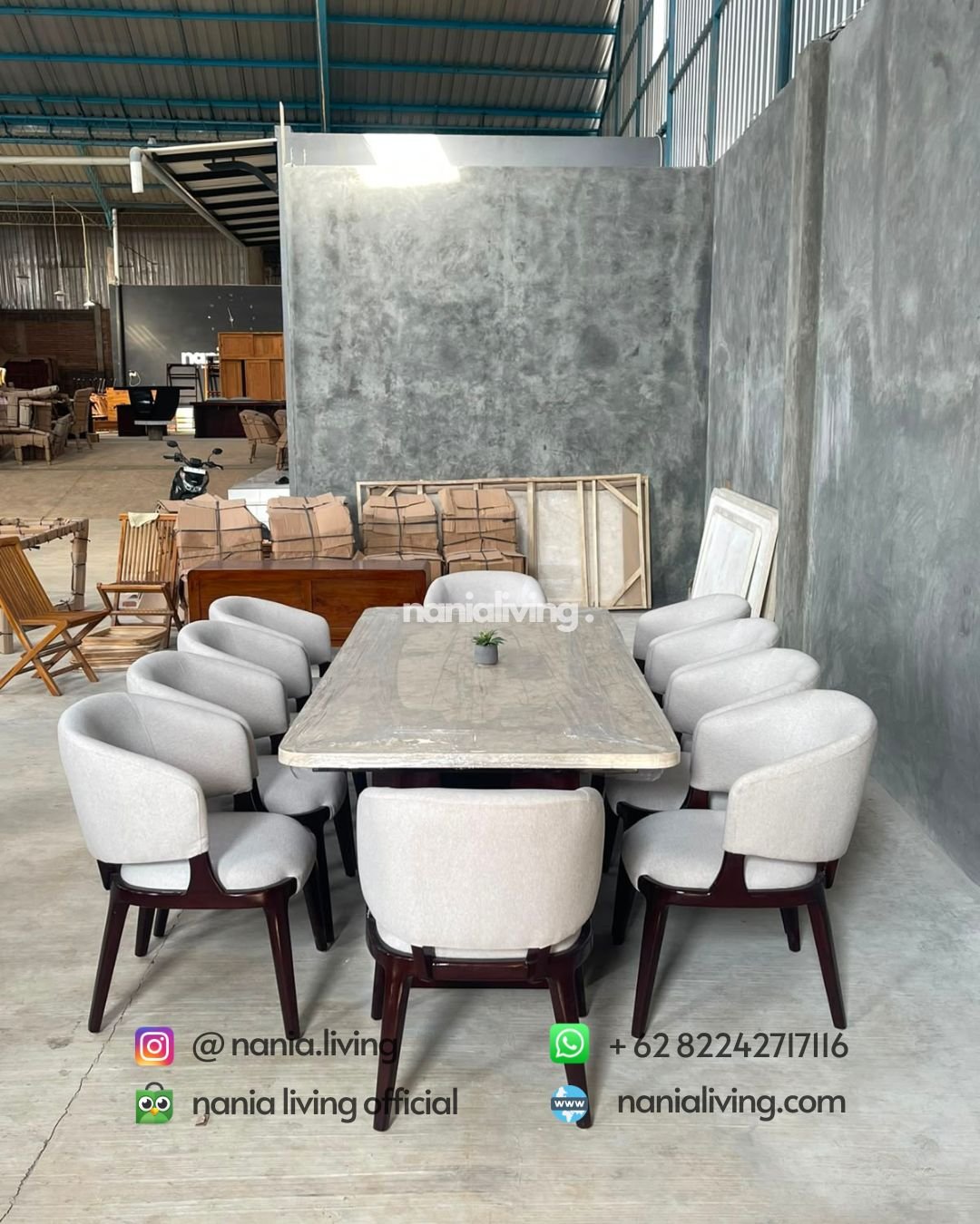 Large cream-coloured marble dining table with 10 Stella chairs (5)
