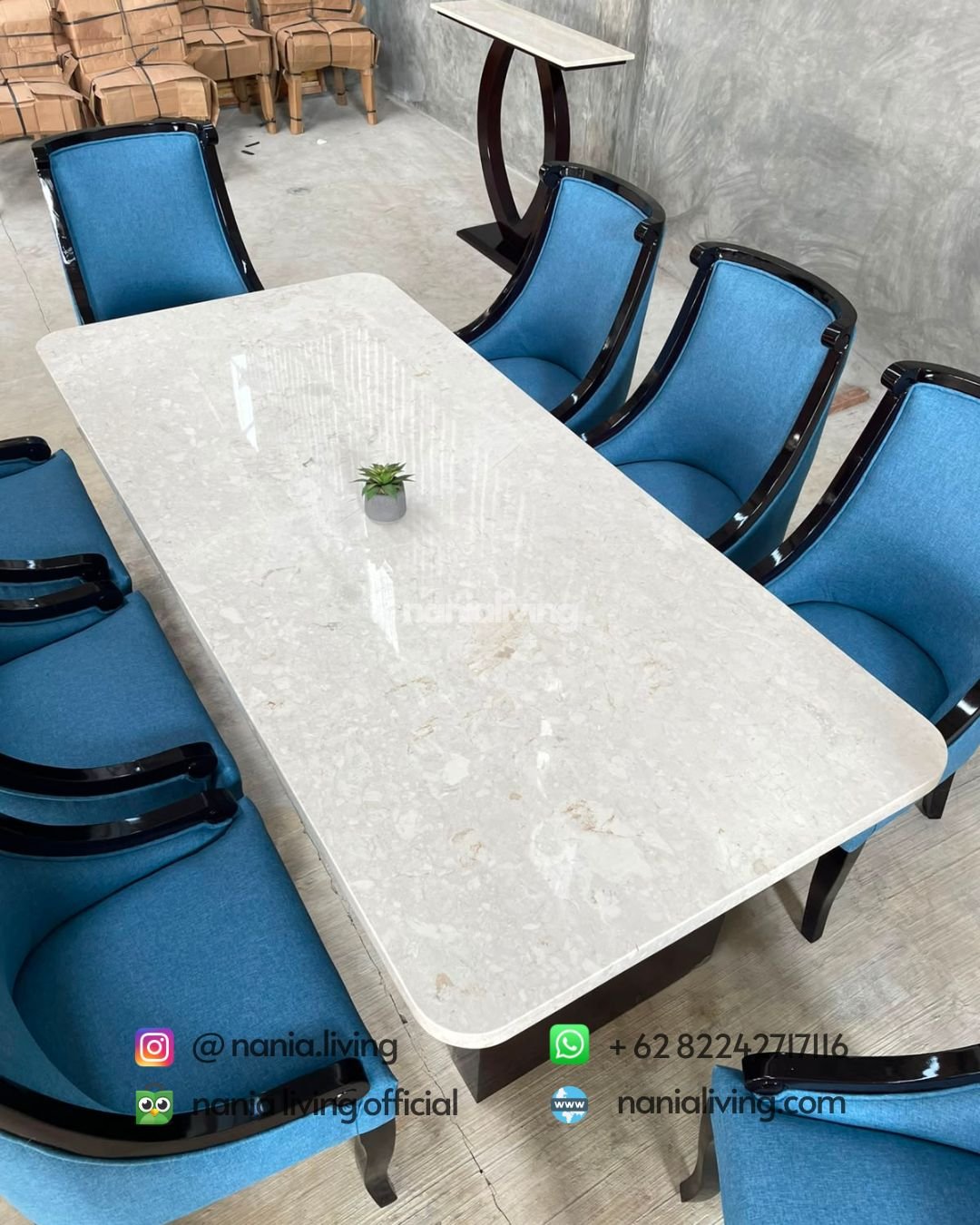 Stella marble dining table with 8 blue spiral-patterned chairs (6)